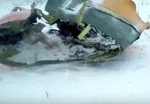 Обломок разбившегося Ан-148 в Подмосковье. Кадр видео с ВК-страницы "Mash | Мэш"